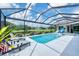 Enjoy the beautiful, screened-in pool, spa, and lake view from the comfort of your backyard at 16038 39Th E Gln, Parrish, FL 34219