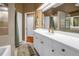 Bathroom with a spacious vanity, modern fixtures, and a combination bathtub/shower at 200 Cocoanut Ave # 1, Sarasota, FL 34236