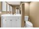 Bathroom featuring a dual vanity, modern fixtures, and ample counter space at 200 Cocoanut Ave # 1, Sarasota, FL 34236