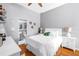 Bright bedroom featuring an ensuite bathroom, clean lines, and soothing colors at 200 Cocoanut Ave # 1, Sarasota, FL 34236