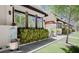 Street view of property showcasing manicured landscaping at 200 Cocoanut Ave # 1, Sarasota, FL 34236