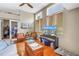 Spacious living room featuring ample natural light, a ceiling fan, and comfortable seating at 200 Cocoanut Ave # 1, Sarasota, FL 34236
