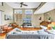 Bright living room with large windows, hardwood floors, and a comfortable seating area at 200 Cocoanut Ave # 1, Sarasota, FL 34236