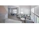 Open-concept living room flows into the dining room, featuring stylish decor and plenty of natural light at 2400 Ezzell Ct, Sarasota, FL 34237