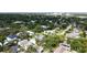 An aerial view showcases the location of this property amongst lush greenery and a quiet neighborhood at 2410 Prospect St, Sarasota, FL 34239