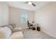 Bright bedroom with a ceiling fan, natural light, and neutral décor at 2410 Prospect St, Sarasota, FL 34239