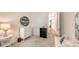 Bedroom boasts natural light, vanity area, and a neutral color palette at 2410 Prospect St, Sarasota, FL 34239
