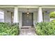 Stylish entrance features a double door, brick pathway and manicured landscaping at 2410 Prospect St, Sarasota, FL 34239
