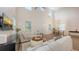 Open-concept living room with modern furnishings and an adjacent dining area at 2410 Prospect St, Sarasota, FL 34239