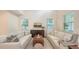 Bright and cozy living room with comfortable sofas and modern decor at 2410 Prospect St, Sarasota, FL 34239