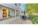 Outdoor patio area featuring an umbrella table, and access to indoor space at 2410 Prospect St, Sarasota, FL 34239