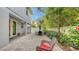 Outdoor patio area featuring an umbrella table, and access to indoor space at 2410 Prospect St, Sarasota, FL 34239