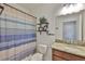 Cozy bathroom with shower and tub combination, granite vanity, and decorative wall accents at 2450 Dovesong Trace Dr, Ruskin, FL 33570