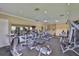 Bright community gym featuring treadmills, stationary bikes, and weightlifting machines at 2450 Dovesong Trace Dr, Ruskin, FL 33570