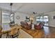 Open-concept living room with modern furnishings and access to the outdoor patio at 2450 Dovesong Trace Dr, Ruskin, FL 33570