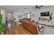 Inviting living room with hardwood floors and comfortable seating area at 2450 Dovesong Trace Dr, Ruskin, FL 33570