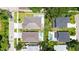 Aerial view of the property showing in-ground pool and lush landscaping at 2596 Floyd St, Sarasota, FL 34239