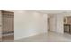 Open Primary bedroom with large closet, multiple doorways, recessed lighting, and a calming, neutral color palette at 2596 Floyd St, Sarasota, FL 34239