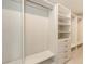 Custom closet boasts built-in shelving and drawers with ample space for storage and organization at 2596 Floyd St, Sarasota, FL 34239