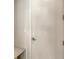 White paneled door with silver hardware and bench seat at 2596 Floyd St, Sarasota, FL 34239