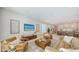 Open-concept living space featuring a modern kitchen, comfortable seating, and stylish decor for a relaxed and inviting atmosphere at 2596 Floyd St, Sarasota, FL 34239
