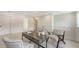 Upstairs landing area showcasing a desk, seating, and natural light for an inviting workspace at 2596 Floyd St, Sarasota, FL 34239