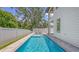 Beautiful in-ground pool with patio and privacy fence at 2596 Floyd St, Sarasota, FL 34239