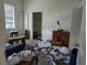 Bedroom interior view showing the need for extensive cleaning and repair at 3006 Hawthorne St, Sarasota, FL 34239