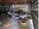 Large garage filled with belongings and debris requiring renovation at 3006 Hawthorne St, Sarasota, FL 34239
