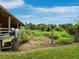 This rural property features a large barn and fenced garden area at 3100 Lena Ln, Sarasota, FL 34240