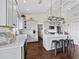 Well-lit kitchen featuring gray cabinets, white countertops, and stainless steel appliances at 3100 Lena Ln, Sarasota, FL 34240