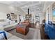 Beautiful living room with fireplace, hardwood floors, and comfortable seating at 3100 Lena Ln, Sarasota, FL 34240