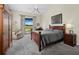 Cozy main bedroom with an exterior view, a comfortable chair, and ample space for relaxation at 3100 Lena Ln, Sarasota, FL 34240
