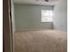 Neutral bedroom with a window providing natural light at 3245 Beneva Rd # 203, Sarasota, FL 34232