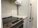Modern kitchen with stainless steel appliances, sleek countertops, and ample cabinet space at 3245 Beneva Rd # 203, Sarasota, FL 34232