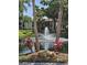 Community pond featuring a fountain for residents to enjoy at 3245 Beneva Rd # 203, Sarasota, FL 34232