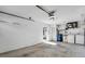 Spacious two car garage with laundry and a blue recycling bin at 327 40Th W Ct, Palmetto, FL 34221
