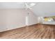 Open living room with hardwood floors, high ceilings, and lots of natural light at 327 40Th W Ct, Palmetto, FL 34221