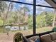 Enjoy serene water views from the comfort of the screened-in lanai at 3767 Pinstar Ter, North Port, FL 34287
