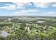 An aerial view of the community with scenic ponds and lush greenery at 3906 Twin Rivers Trl, Parrish, FL 34219