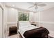 Bedroom featuring natural light, a ceiling fan, and modern decor and paint scheme at 3906 Twin Rivers Trl, Parrish, FL 34219