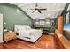 Spacious bedroom featuring hardwood floors, a decorative ceiling, and modern furnishings at 3906 Twin Rivers Trl, Parrish, FL 34219