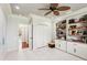 Bonus room featuring natural light, a ceiling fan, built-in shelving, and a closet at 3906 Twin Rivers Trl, Parrish, FL 34219
