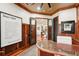 Elegant home office with wood accents, modern decor, and plenty of natural light at 3906 Twin Rivers Trl, Parrish, FL 34219