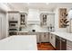 Well-equipped kitchen featuring stainless steel appliances, ample counter space, and custom cabinetry at 3906 Twin Rivers Trl, Parrish, FL 34219