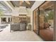 Entertainers delight with this outdoor kitchen and grilling area, perfect for hosting Gathering and friends at 3906 Twin Rivers Trl, Parrish, FL 34219