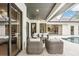 Relax and unwind in this tranquil screened-in lanai with comfortable seating and a view of the pool at 3906 Twin Rivers Trl, Parrish, FL 34219