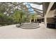 Beautiful screened-in lanai features an elegant pool and spa, surrounded by lush landscaping at 3906 Twin Rivers Trl, Parrish, FL 34219