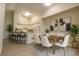 Bright dining area and kitchen with stainless steel appliances and breakfast bar, ideal for entertaining at 4140 Central Sarasota Pkwy # 1235, Sarasota, FL 34238