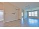 Bright, empty living room featuring hardwood floors, recessed lighting, and a ceiling fan at 4140 Central Sarasota Pkwy # 1235, Sarasota, FL 34238